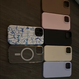 Assorted Phone Cases - Black, Cream, Purple, Brown, Pink, Blue 
I Phone 15